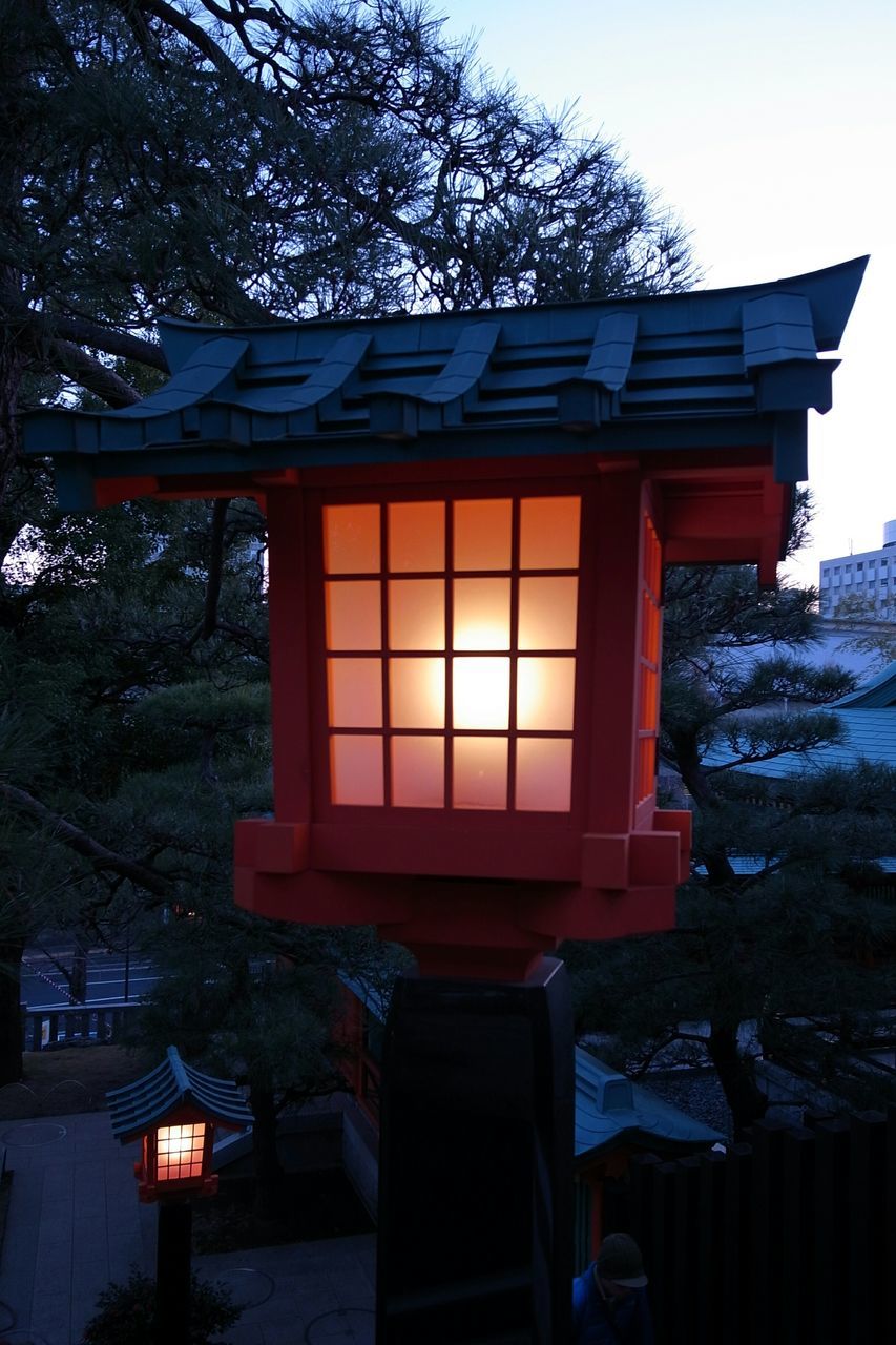 built structure, architecture, building exterior, tree, house, wood - material, sunset, roof, gazebo, sunlight, orange color, residential structure, clear sky, sky, outdoors, window, entrance, no people, day, chair