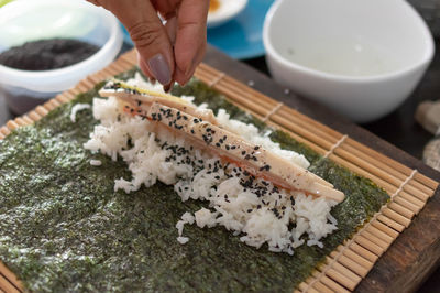 Close-up of person preparing food