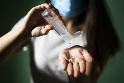 Close-up of woman holding hands