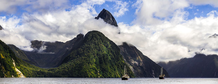 Panoramic view of sea against mountains