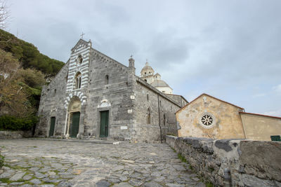 Low angle view of old building against sky