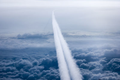 Aerial view of vapor trail in sky