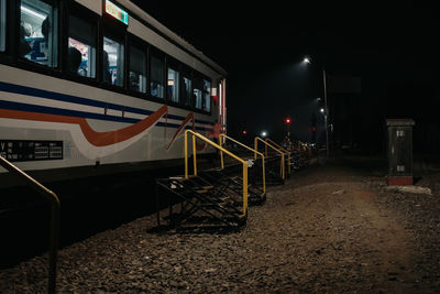 Train on railroad track at night