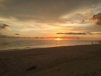 Scenic view of beach during sunset