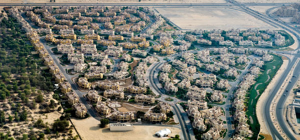High angle view of highway by river in city
