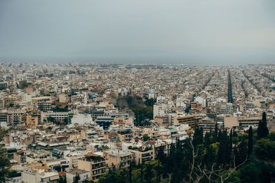High angle shot of townscape against sky of athens