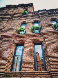 Low angle view of old building against sky