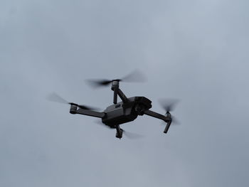 Low angle view of airplane against clear sky