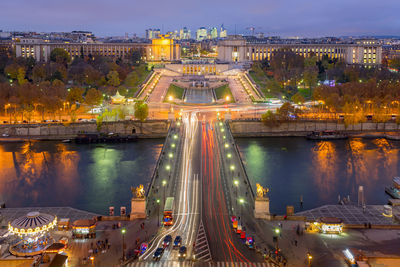 High angle view of illuminated buildings in city at night