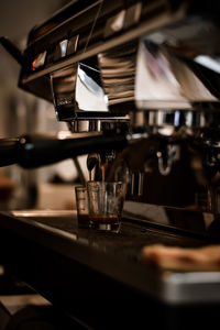 Close-up of espresso maker in cafe
