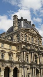 Low angle view of historic building against sky