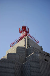 Low angle view of building against blue sky