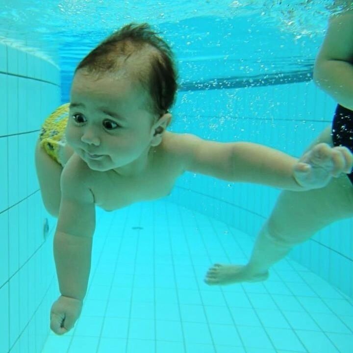 lifestyles, childhood, indoors, leisure activity, swimming pool, blue, fun, full length, person, elementary age, boys, water, girls, innocence, enjoyment, togetherness, cute