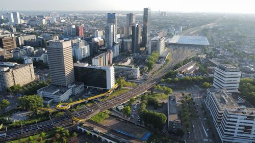 The city center of rotterdam with skyline and the train station
