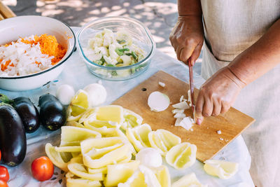 Midsection of man preparing food
