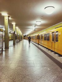 Woman at railroad station