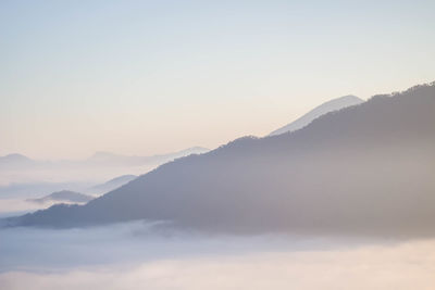 Scenic view of mountains against sky during sunset