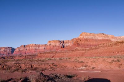 Landscape of barren colorful stone hillsides at marble canyon in arizona