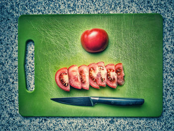 High angle view of fruits on cutting board