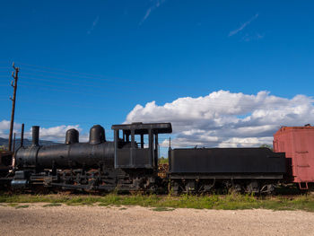 Steam train against blue sky