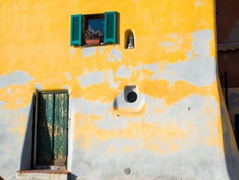 Close-up of yellow door