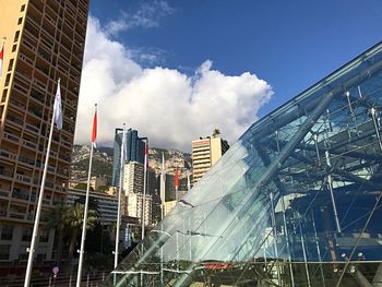 Low angle view of cityscape against sky