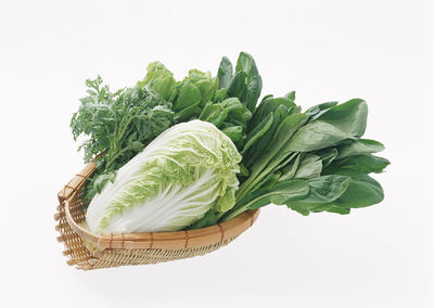 Close-up of vegetables against white background