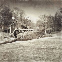 Built structure with trees in foreground