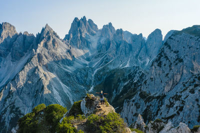 High angle view of snowcapped mountains against sky