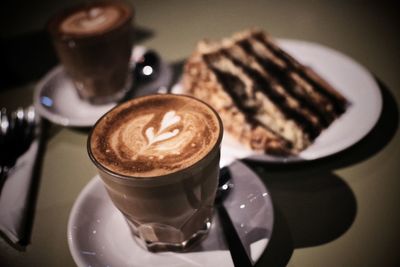 High angle view of coffee cup on table