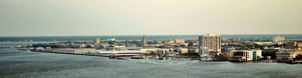 Cityscape with sea in background