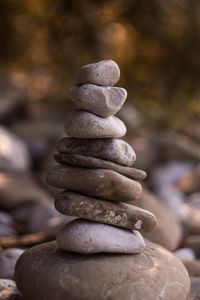 Close-up of stone stack on rock