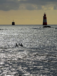 View of lighthouse in sea