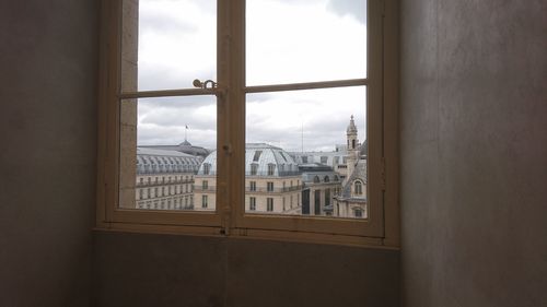 Buildings seen through window