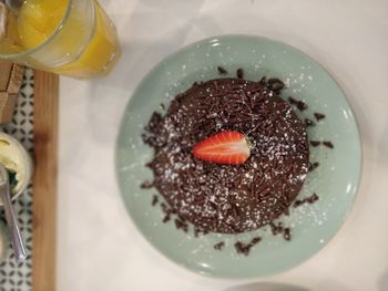 High angle view of cake in plate on table