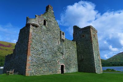 Low angle view of old castle against sky