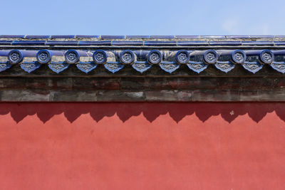 Low angle view of roof against clear sky