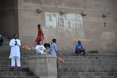 People sitting on staircase