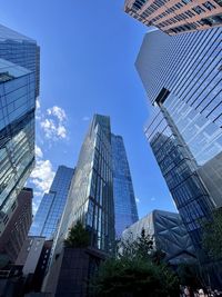 Low angle view of skyscrapers against sky