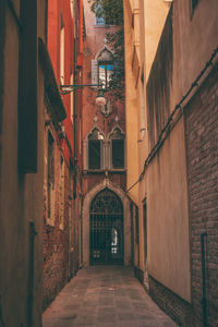 Narrow alley along buildings