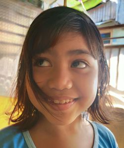 Close-up portrait of a smiling girl