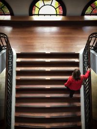 Woman standing on stairs