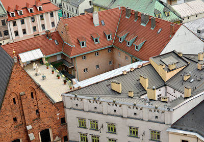 High angle view of houses against sky in city