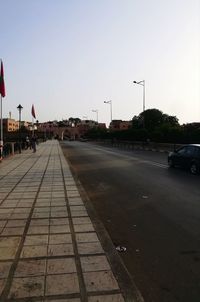 Street in city against clear sky