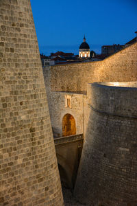 View of temple in city at night