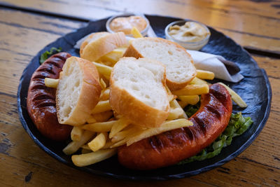 High angle view of hot dog in plate on table