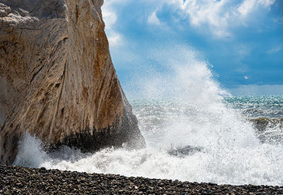 Sea waves splashing on rocks