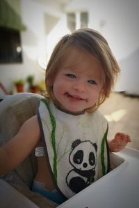 Portrait of smiling boy at home