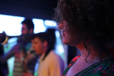 Young woman at music concert