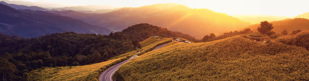 Panoramic view of mountains against sky during sunset